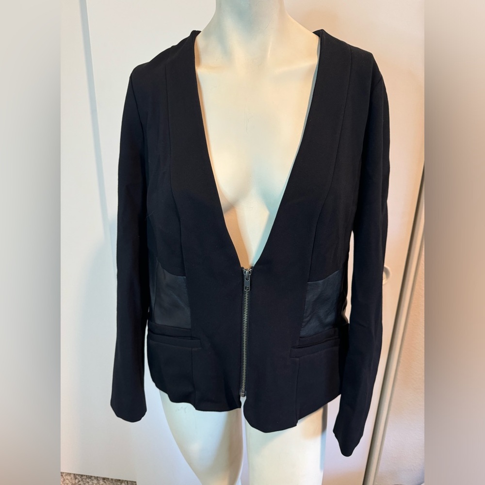 TORRID black/leather corset blazer.